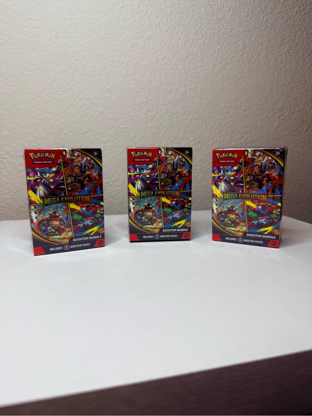 Pokemon Mega Evolution Booster Bundles - Red, Yellow, Blue